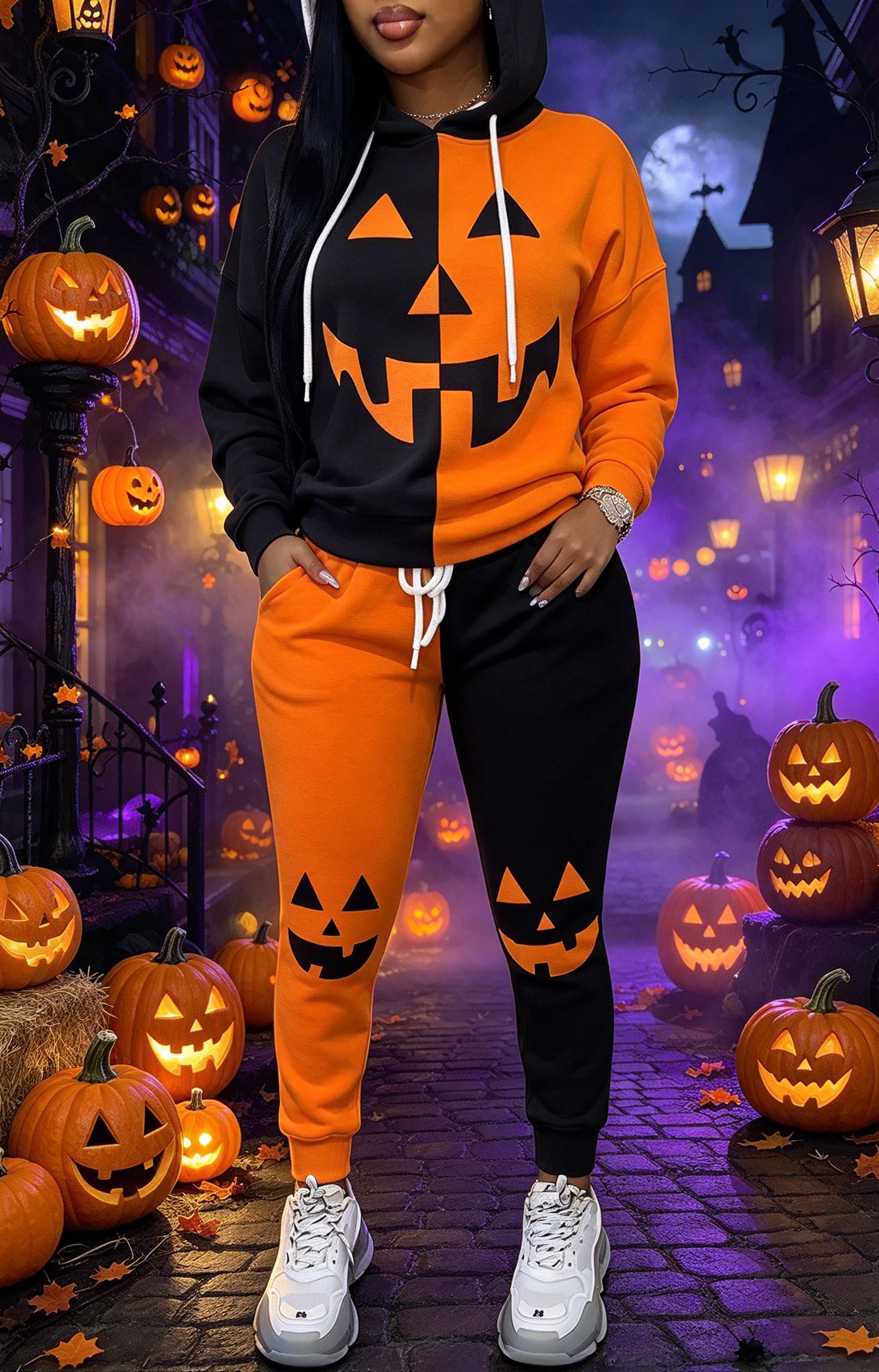 Joggers Pants - レディース ハロウィン カラーブロック フード付き トラックスーツ、カボチャの顔プリントが施されたパーカーと、裾が絞られたジョガーパンツの2点セット。